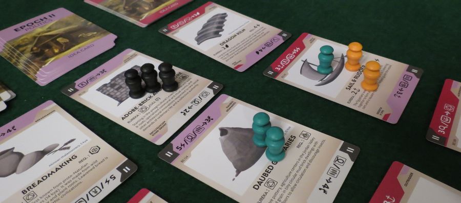 Bios: Origins (2nd edition board game) - cards with elder pawns on top