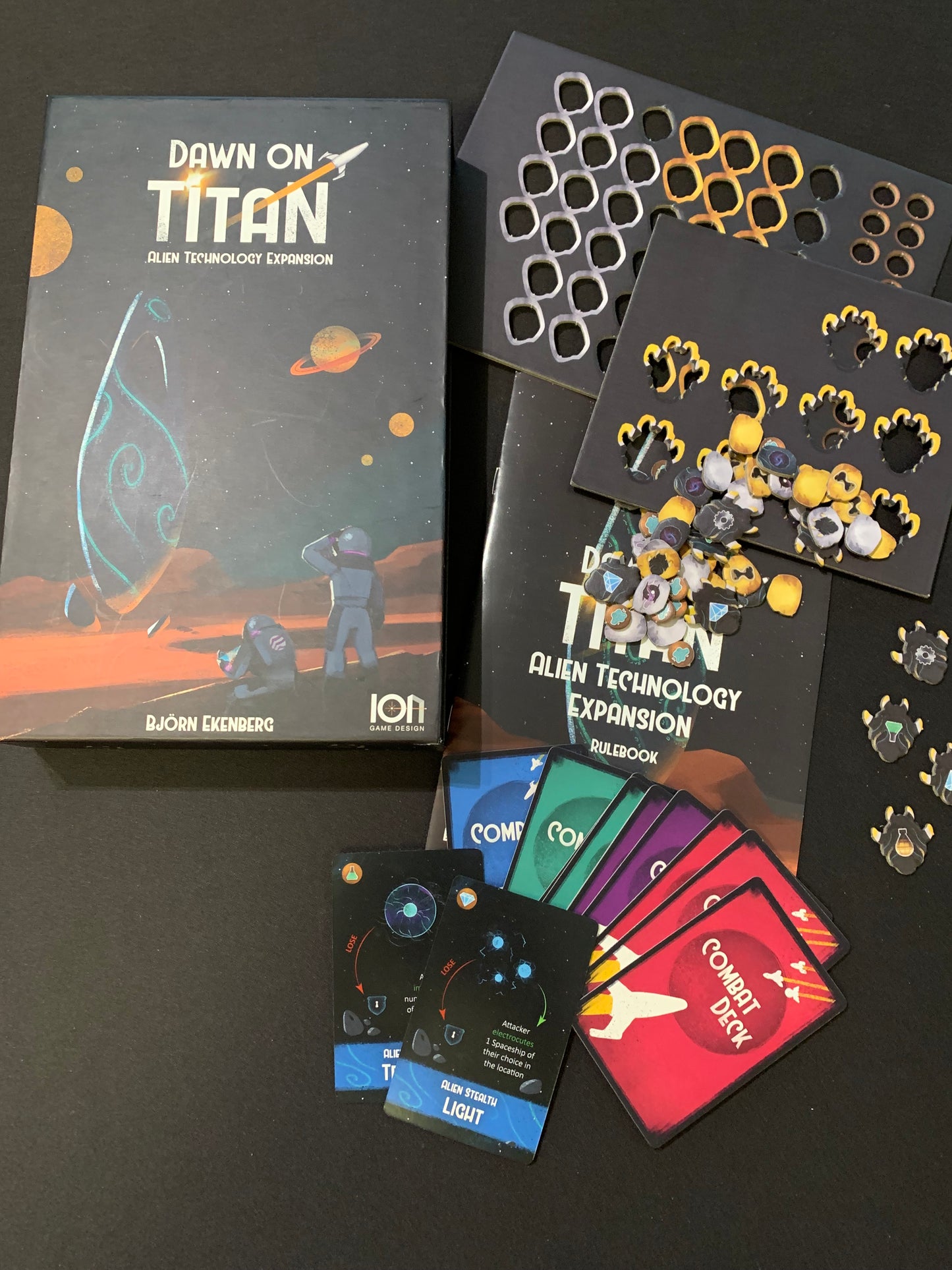 Dawn on Titan Alien Game Expansion Pack - Game components (playing cards, tokens, and gameplay booklet)