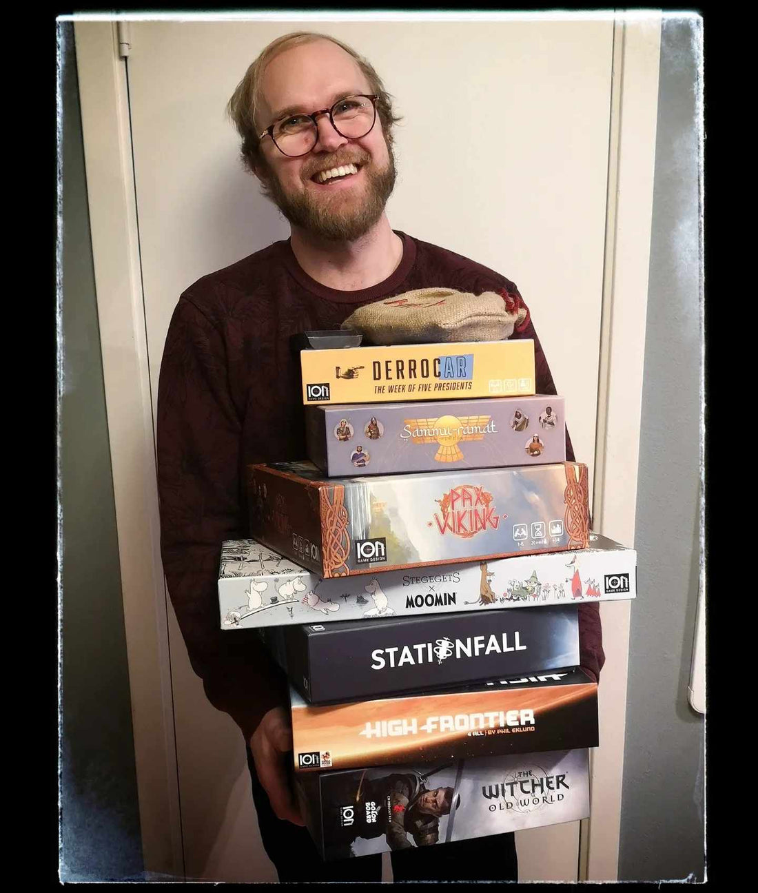 Game Developer Robin showing some of the games that will be in Essen