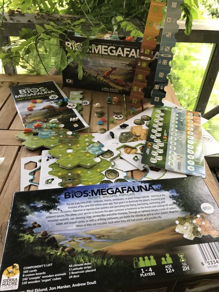 Bios: Megafauna (2nd edition board game) - Overview display of game components and pieces
