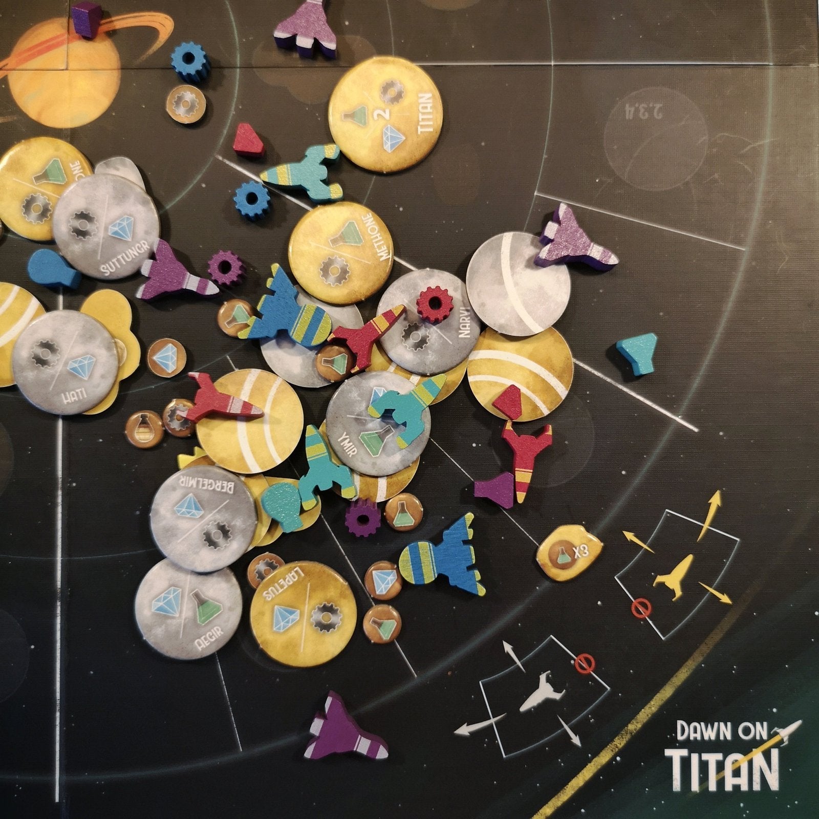 Dawn on Titan Board Game - all game pieces displayed in a pile on the board