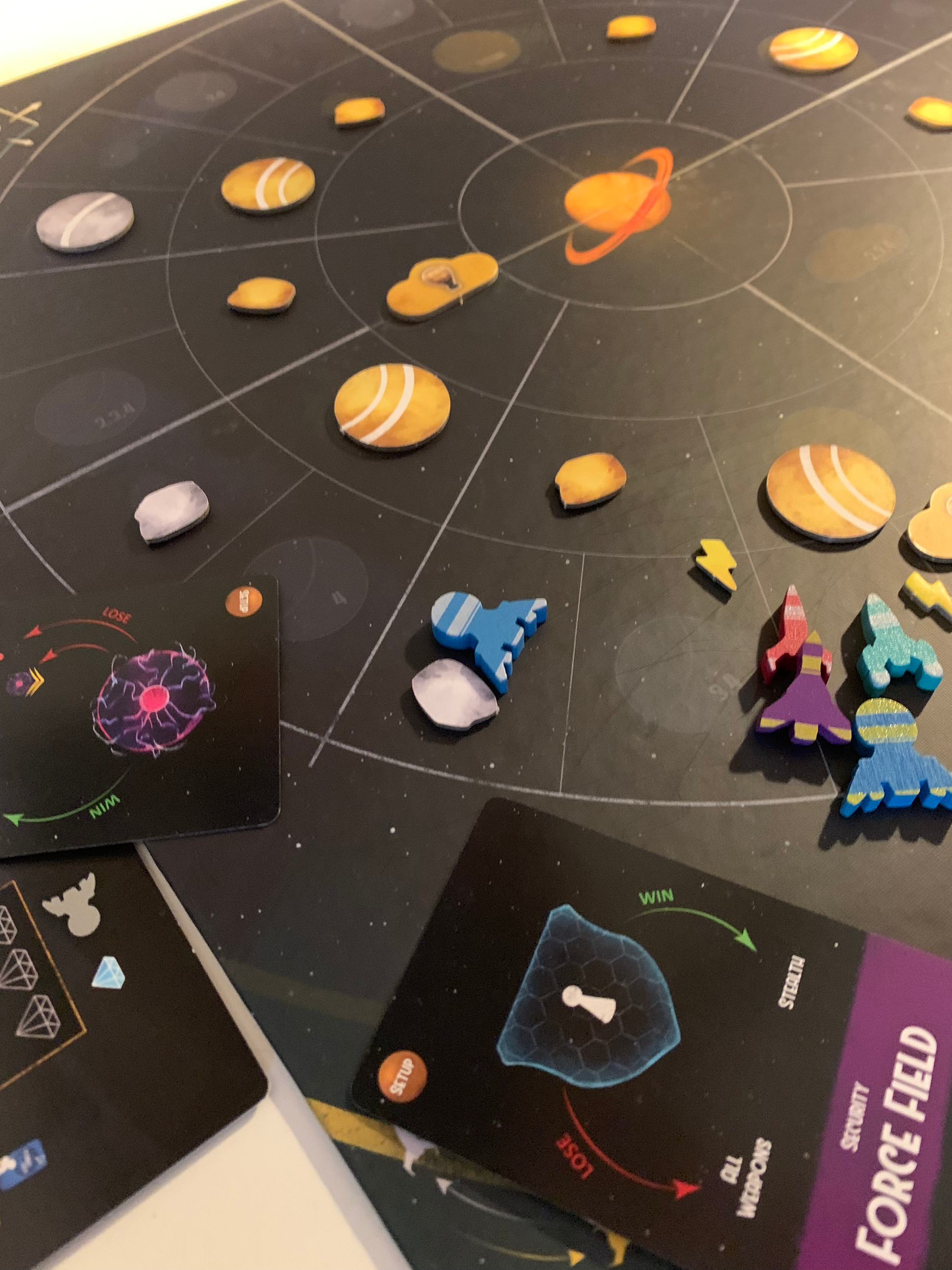 Dawn on Titan Board Game - game board action shot featuring space ship pieces and game cards