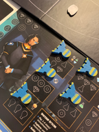 Dawn on Titan Board Game -  blue space ship pieces set up on their player board