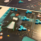 Dawn on Titan Board Game - green space ship pieces set up on their player board
