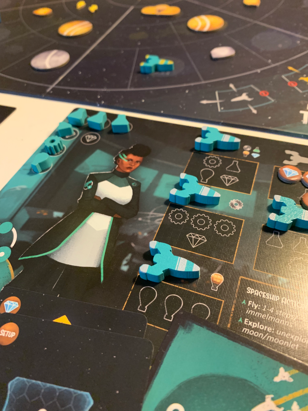 Dawn on Titan Board Game - green space ship pieces set up on their player board