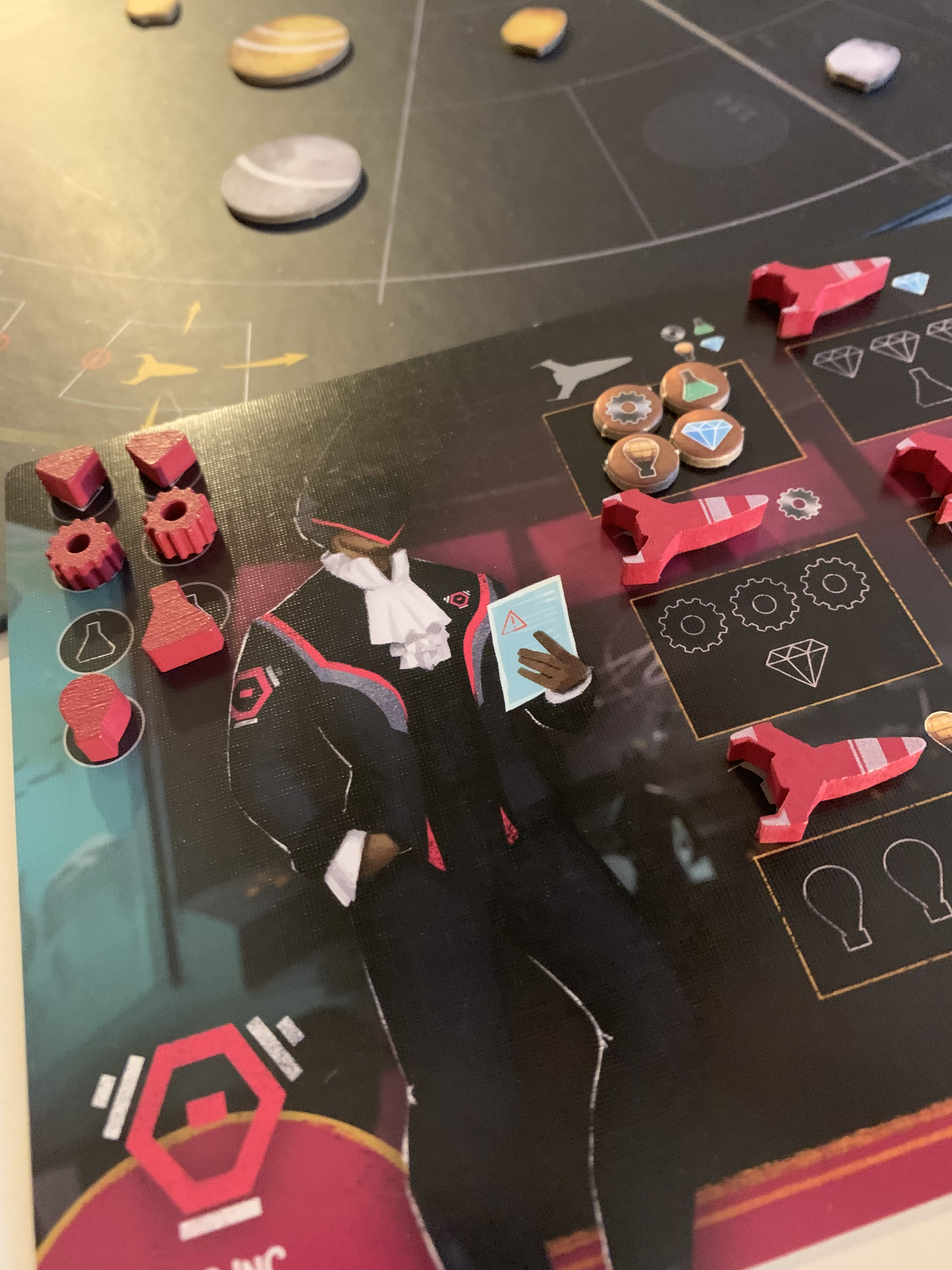 Dawn on Titan Board Game - red space ship pieces set up on their player board