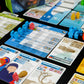Greenland board game character cards and character figurines arranged in a playing position on a table