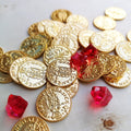 Expanded view of a cluster of metal game coins and gem tokens