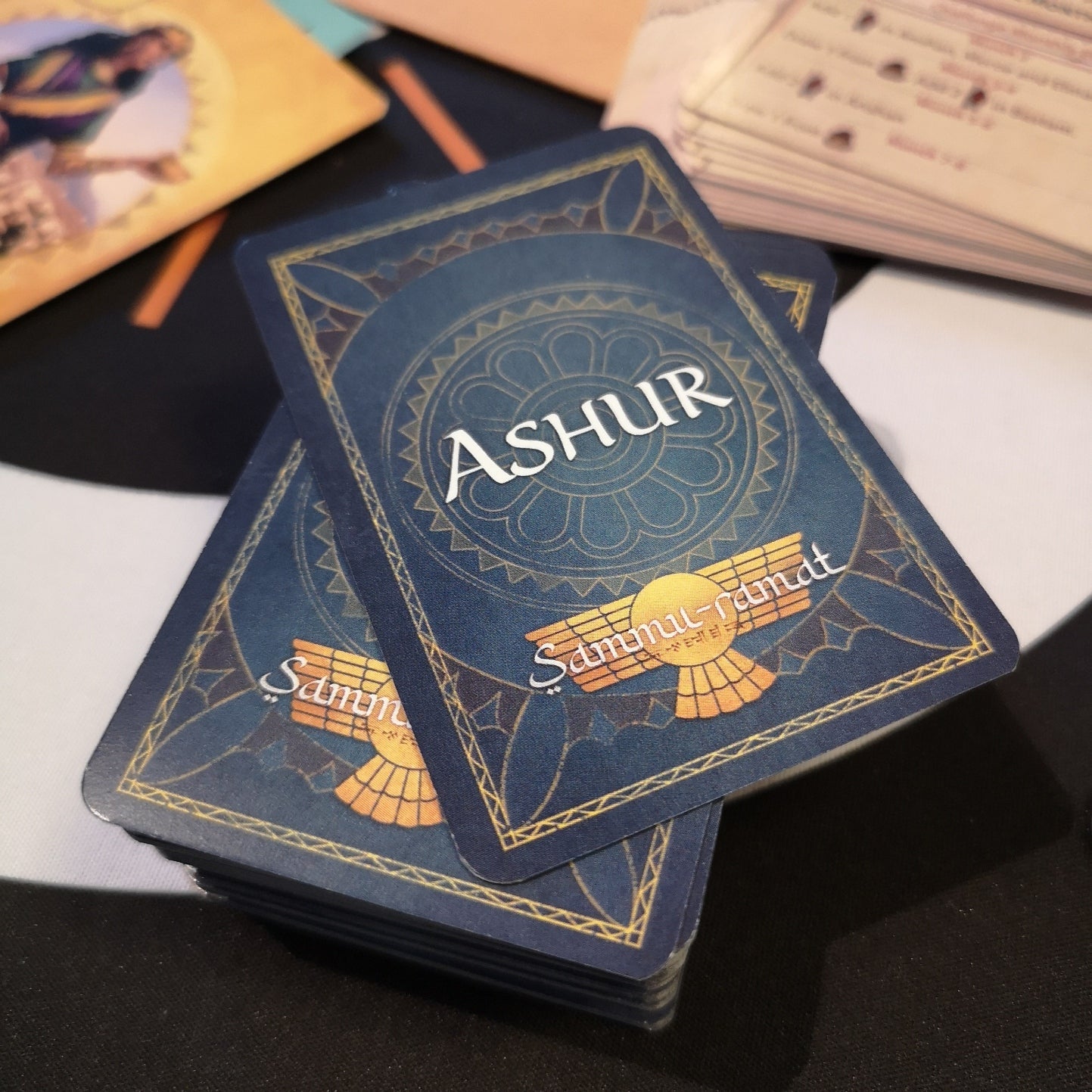Sammu-Ramat Board Game - Close up of a stack of Ashur cards