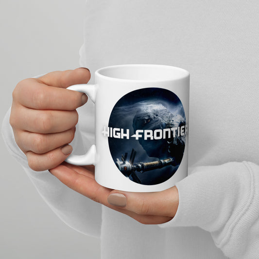 High Frontier: Rocket Fuel Mug - Face view of mug being held, featuring the cover design from ION's board game, "High Frontier"