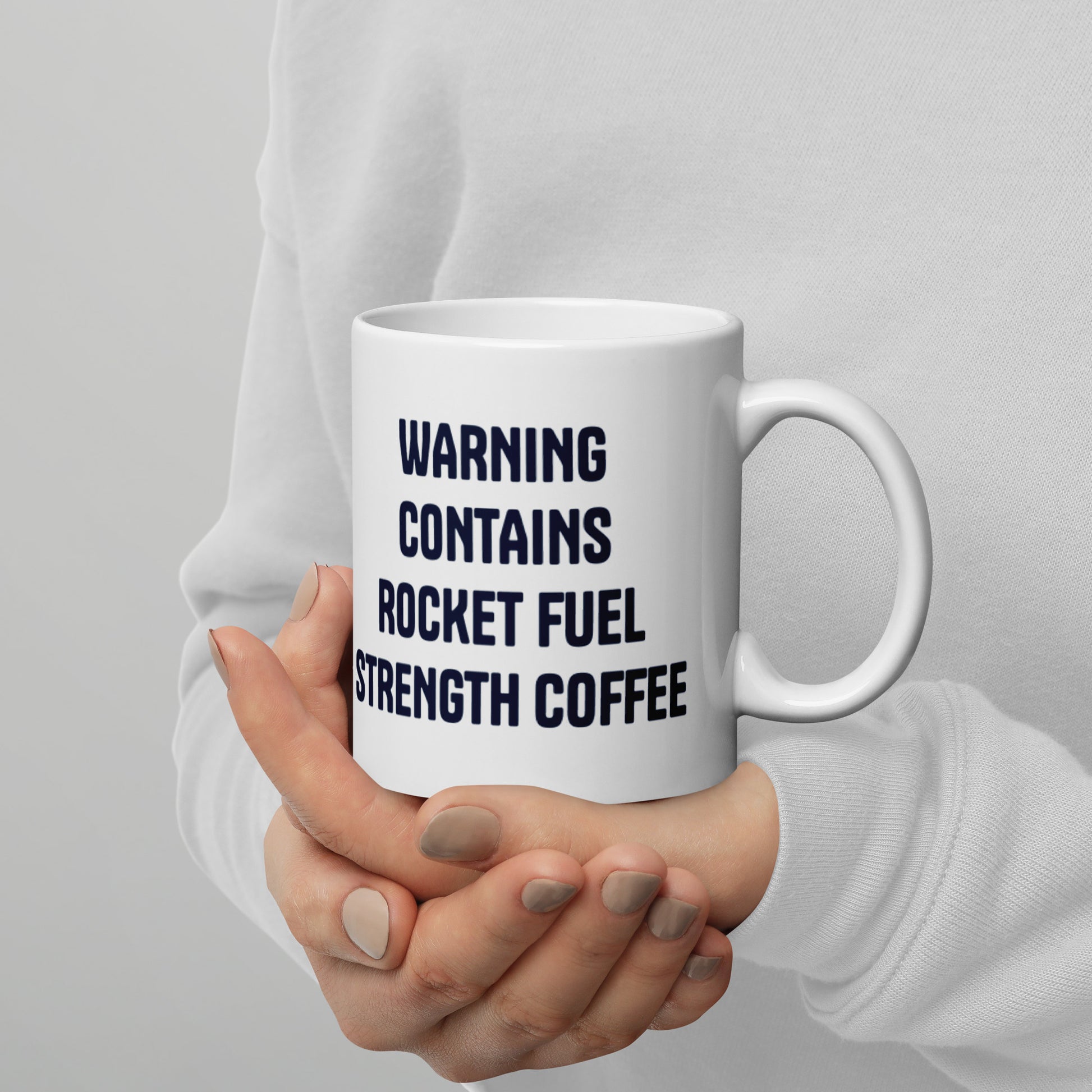 High Frontier: Rocket Fuel Mug - Rear view of mug, embellished with the quote, "Warning. Contains rocket fuel strength coffee"